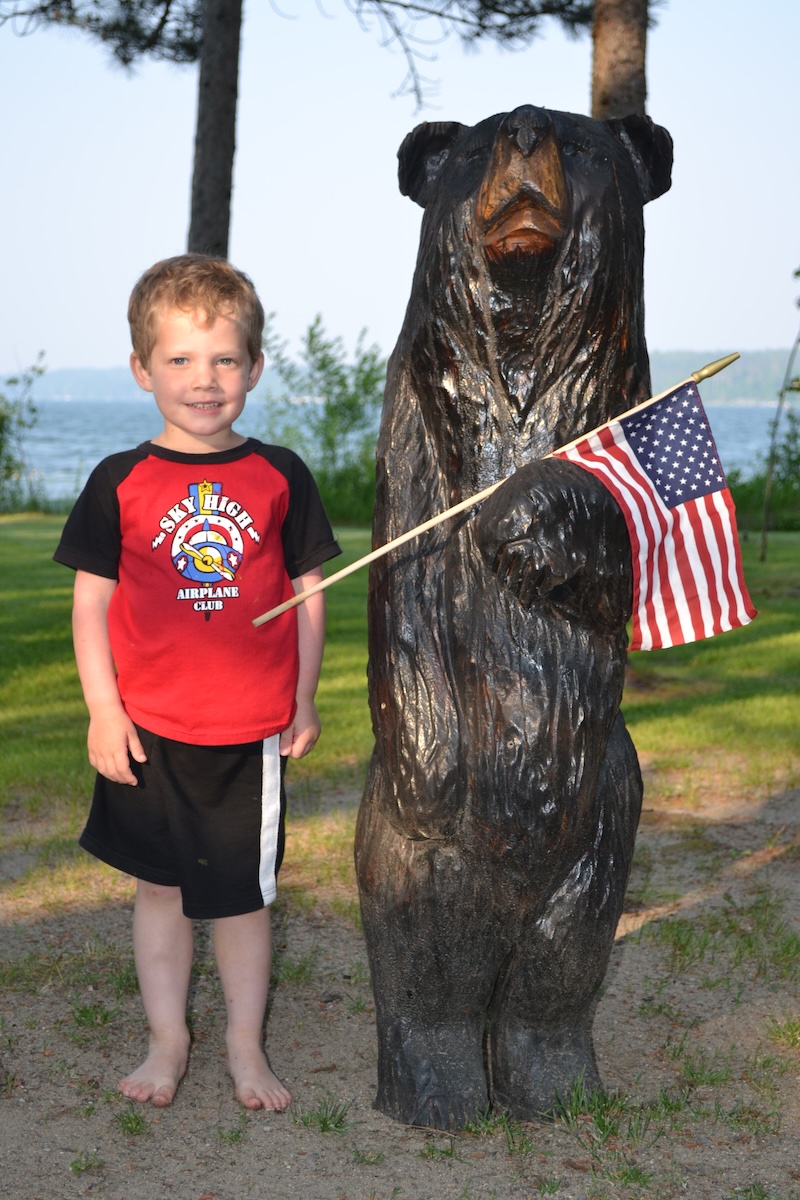 Carved bear statue at Camp Liberty Resort