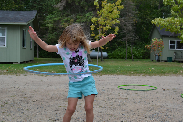 Kids hula hooping at Camp Liberty Resort